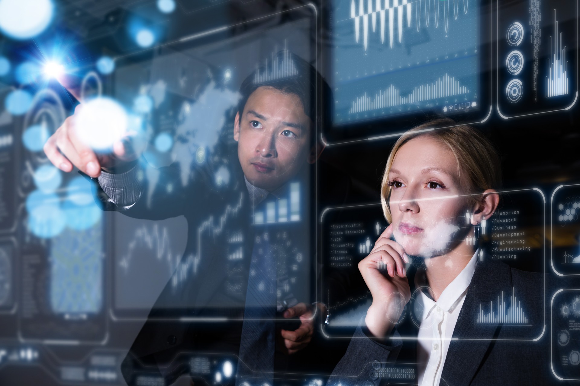 Two business persons in front of futuristic display. Graphical User Interface(GUI). Head up Display(HUD). Internet of things.